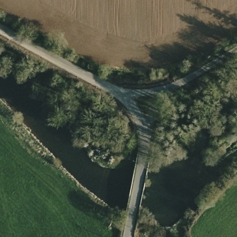 Wider aerial context showing Killardry Bridge below the road junction and the north-side bank detail.